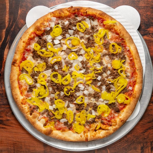 Bruno Scipioni's Italian Ristorante & Pizzeria's pizza with ground meat, onions, and yellow peppers.